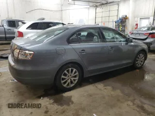 2013 Volkswagen Jetta SE with VIN 3VWDX7AJ2DM309725, listed as a Copart auction lot 86052114 with 70,828 mi miles and Salvage title. Bid and sale history available at DreamBid. Image 3.