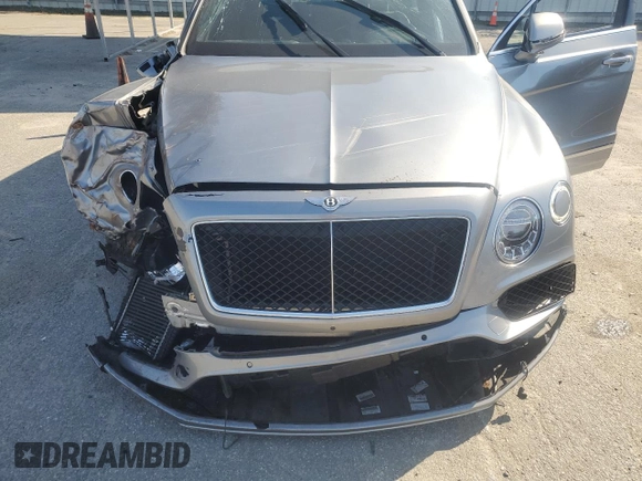 2019 Bentley Bentayga V8 z VIN SJAAM2ZV9KC024755, wystawiony jako Copart lot #46757605 z przebiegiem 26 951 mil mil oraz Szkoda całkowita • Salvage title. Historia ofert i sprzedaży dostępna na DreamBid. Obrazek 12.