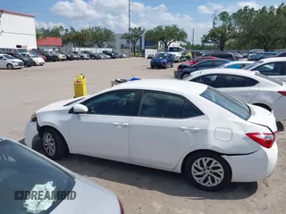 2015 Toyota Corolla L z VIN 5YFBURHE3FP271683, wystawiony jako IAAI lot #37424533 z przebiegiem 153 438 mil mil oraz . Historia ofert i sprzedaży dostępna na DreamBid. Obrazek 14.