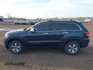 2014 Jeep Grand Cherokee Limited with VIN 1C4RJFBG4EC363411, listed as a IAAI auction lot 41822259 with 132,660 mi miles. Bid and sale history available at carsss.com. Image 14.