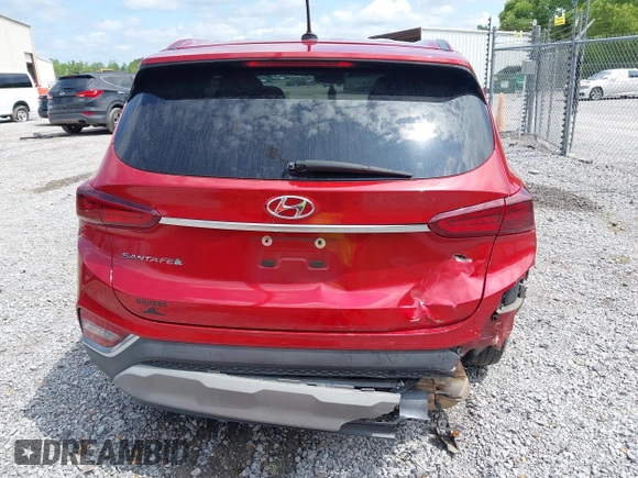 2019 Hyundai Santa Fe SE z VIN 5NMS23AD8KH025141, wystawiony jako IAAI lot #42209919 z przebiegiem 176 172 mil mil oraz . Historia ofert i sprzedaży dostępna na DreamBid. Obrazek 16.