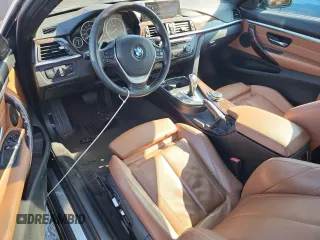 2016 BMW 4 Series 428i xDrive with VIN WBA3N9C52GK249387, listed as a Copart auction lot 65697805 with 203,385 mi miles and Clean title. Bid and sale history available at DreamBid. Image 8.