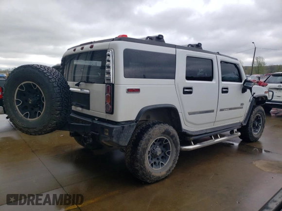 2003 Hummer H2 with VIN 5GRGN23U43H128269, listed as a Copart auction lot 47992444 with 153,360 mi miles and Salvage Title. Bid and sale history available at carsss.com. Image 3.