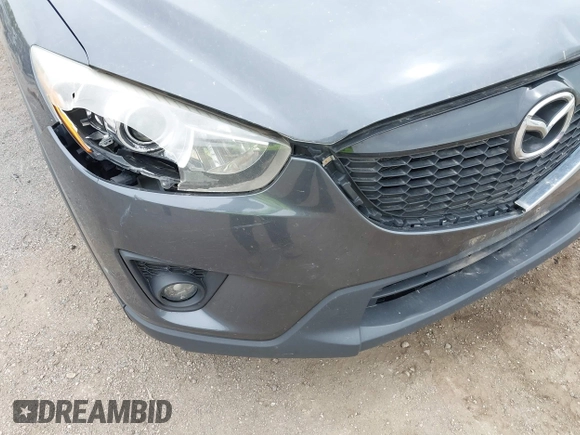 2014 Mazda CX-5 Touring with VIN JM3KE2CYXE0332517, listed as a IAAI auction lot 42109592 with 138,214 mi miles. Bid and sale history available at carsss.com. Image 6.