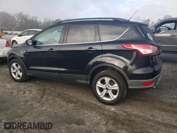 2014 Ford Escape SE with VIN 1FMCU9GX2EUC86115, listed as a Copart auction lot 82810324 with 212,346 mi miles and Salvage Title. Bid and sale history available at DreamBid. Image 2.