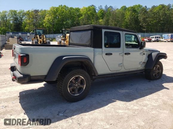 2023 Jeep Gladiator Rubicon с VIN 1C6JJTBG2PL542178, выставлен на аукционе Copart как лот 54684915 с пробегом 24 687 миль миль и Списание • Salvage title. История ставок и продаж доступна на DreamBid. Изображение 3.