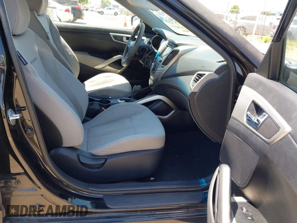 2013 Hyundai Veloster w/Black Int with VIN KMHTC6AD2DU144376, listed as a IAAI auction lot 42720882 with 143,023 mi miles and . Bid and sale history available at DreamBid. Image 5.