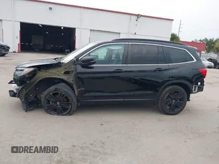 2021 Honda Pilot Special Edition with VIN 5FNYF5H27MB043732, listed as a IAAI auction lot 39777255 with 56,087 mi miles and . Bid and sale history available at DreamBid. Image 14.