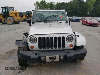 2007 Jeep Wrangler Unlimited Sahara с VIN 1J4GA591X7L158014, выставлен на аукционе Copart как лот 55201105 с пробегом 162 797 миль миль и Списание • Salvage title. История ставок и продаж доступна на DreamBid. Изображение 5.