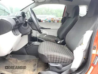 2012 Scion iQ with VIN JTNJJXB07CJ017816, listed as a Copart auction lot 59616355 with 141,384 mi miles and Salvage title. Bid and sale history available at DreamBid. Image 7.