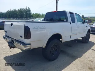 2000 Ford F-150 XL with VIN 1FTRX18W2YKA46754, listed as a IAAI auction lot 42451747 with Not provided miles and . Bid and sale history available at DreamBid. Image 4.