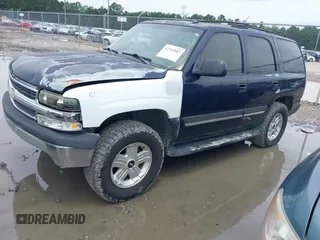 2005 Chevrolet Tahoe LS z VIN 1GNEC13T853189000, wystawiony jako IAAI lot #42361882 z przebiegiem 212 074 mil mil oraz . Historia ofert i sprzedaży dostępna na DreamBid. Obrazek 2.