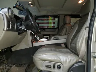 2004 Hummer H2 with VIN 5GRGN23U94H110447, listed as a Copart auction lot 41465315 with 246,501 mi miles and Salvage Title. Bid and sale history available at carsss.com. Image 7.