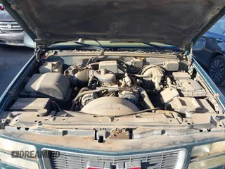 1997 GMC Yukon with VIN 1GKEK13R1VJ723409, listed as a IAAI auction lot 41512184 with 235,988 mi miles. Bid and sale history available at carsss.com. Image 10.