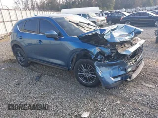 2020 Mazda CX-5 Touring with VIN JM3KFACM0L0775020, listed as a IAAI auction lot 40876970 with 96,424 mi miles. Bid and sale history available at carsss.com. Image 1.