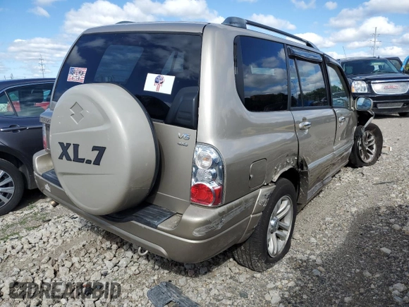 2005 Suzuki XL7 LX z VIN JS3TX92V854105506, wystawiony jako Copart lot #60683524 z przebiegiem 197 035 mil mil oraz Szkody całkowita. Historia ofert i sprzedaży dostępna na DreamBid. Obrazek 3.