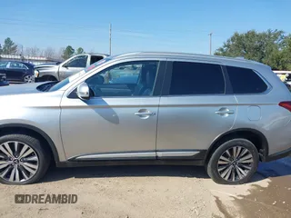 2020 Mitsubishi Outlander ES z VIN JA4AZ3A38LZ024741, wystawiony jako IAAI lot #41599013 z przebiegiem 184 469 mil mil oraz . Historia ofert i sprzedaży dostępna na DreamBid. Obrazek 14.
