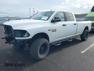 2013 Ram 2500 SLT with VIN 3C6TR5JT5DG517635, listed as a IAAI auction lot 40950960 with 99,372 mi miles and . Bid and sale history available at DreamBid. Image 2.