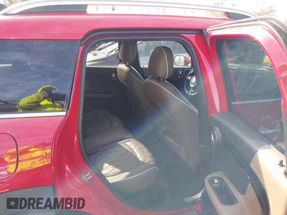 2019 MINI Countryman Cooper S with VIN WMZYT5C57K3E69637, listed as a IAAI auction lot 41379982 with 100,891 mi miles. Bid and sale history available at carsss.com. Image 8.