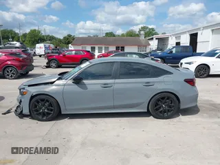 2025 Honda Civic Sport with VIN 2HGFE2F57SH571849, listed as a IAAI auction lot 41902538 with 869 mi miles and . Bid and sale history available at DreamBid. Image 14.