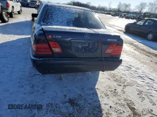 1997 Mercedes-Benz E-Class with VIN WDBJF72F8VA268145, listed as a Copart auction lot 86351464 with 94,324 mi miles and Salvage Title. Bid and sale history available at carsss.com. Image 6.