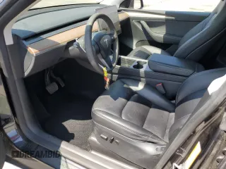2024 Tesla Model Y Long Range z VIN 7SAYGDEE0RF062395, wystawiony jako Copart lot #55071185 z przebiegiem 42 747 mil mil oraz Szkoda całkowita • Salvage title. Historia ofert i sprzedaży dostępna na DreamBid. Obrazek 7.