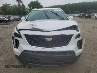 2019 Cadillac XT4 FWD Sport z VIN 1GYFZER49KF199885, wystawiony jako Copart lot #56836895 z przebiegiem 58 486 mil mil oraz Szkoda całkowita • Salvage title. Historia ofert i sprzedaży dostępna na DreamBid. Obrazek 5.