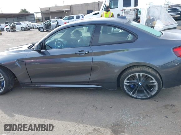 2018 BMW M2 with VIN WBS1J5C50JVE51869, listed as a IAAI auction lot 41814404 with 69,684 mi miles. Bid and sale history available at carsss.com. Image 14.