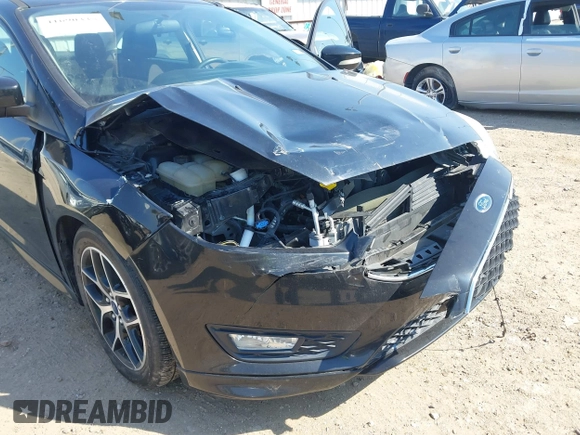 2016 Ford Focus SE with VIN 1FADP3F25GL344302, listed as a IAAI auction lot 41690335 with 43,143 mi miles. Bid and sale history available at carsss.com. Image 6.