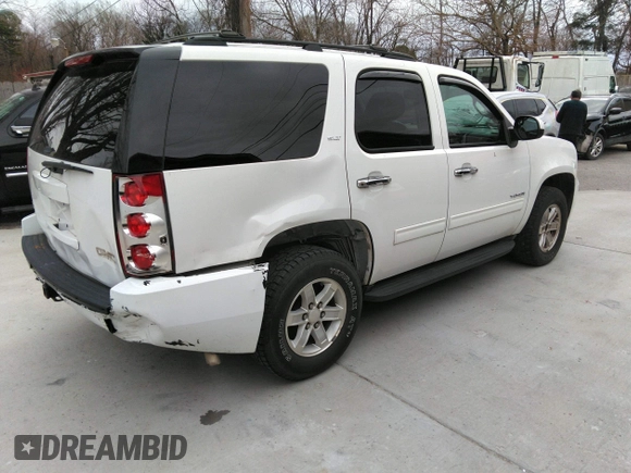 2013 GMC Yukon SLT with VIN 1GKS2CE09DR238626, listed as a IAAI auction lot 41758168 with 170,371 mi miles. Bid and sale history available at carsss.com. Image 4.