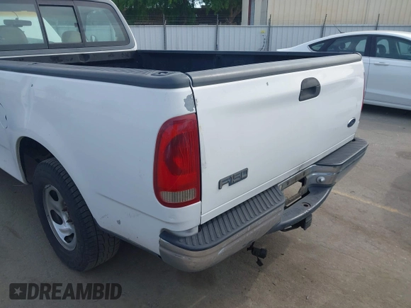 1998 Ford F-150 with VIN 1FTZF1728WKB79405, listed as a IAAI auction lot 41974754 with 278,674 mi miles and . Bid and sale history available at DreamBid. Image 13.