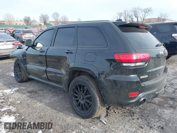 2017 Jeep Grand Cherokee SRT with VIN 1C4RJFDJ7HC641926, listed as a IAAI auction lot 41272215 with 117,667 mi miles. Bid and sale history available at carsss.com. Image 3.