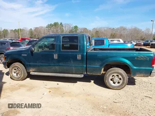 1999 Ford Super Duty F-250 XL with VIN 1FTNW21S2XEE10313, listed as a IAAI auction lot 41825300 with 150,619 mi miles. Bid and sale history available at carsss.com. Image 14.