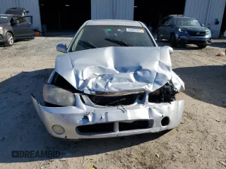 2006 Kia Spectra with VIN KNAFE161965323828, listed as a Copart auction lot 69583934 with 152,000 mi miles and Salvage Title. Bid and sale history available at carsss.com. Image 5.