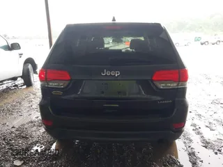 2014 Jeep Grand Cherokee Laredo with VIN 1C4RJEAG6EC206748, listed as a IAAI auction lot 42244421 with 198,217 mi miles and . Bid and sale history available at DreamBid. Image 16.