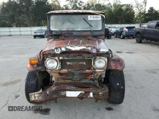 1979 Toyota Land Cruiser z VIN FJ40301186, wystawiony jako Copart lot #81364664 z przebiegiem 9 490 mil mil oraz Czysty tytuł • Clean title. Historia ofert i sprzedaży dostępna na DreamBid. Obrazek 5.