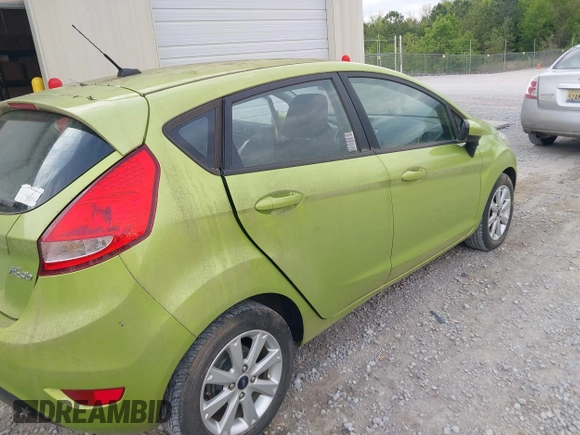 2011 Ford Fiesta SE with VIN 3FADP4EJXBM164397, listed as a IAAI auction lot 42046591 with 118,953 mi miles. Bid and sale history available at carsss.com. Image 6.