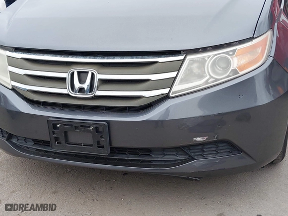 2011 Honda Odyssey EX-L with VIN 5FNRL5H66BB015305, listed as a IAAI auction lot 42065872 with 190,580 mi miles. Bid and sale history available at carsss.com. Image 6.