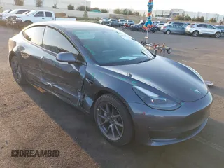 2021 Tesla Model 3 Long Range with VIN 5YJ3E1EBXMF995814, listed as a IAAI auction lot 41838453 with 51,415 mi miles. Bid and sale history available at carsss.com. Image 1.