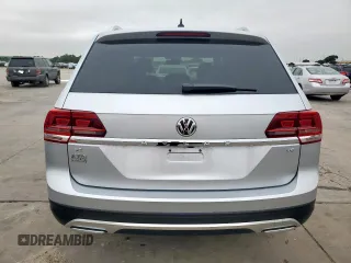 2018 Volkswagen Atlas SE с VIN 1V2CR2CAXJC563350, выставлен на аукционе Copart как лот 59360125 с пробегом 140 320 миль миль и Списание • Salvage title. История ставок и продаж доступна на DreamBid. Изображение 6.