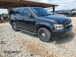 2014 Chevrolet Tahoe Commercial with VIN 1GNLC2E00ER164108, listed as a Copart auction lot 63034785 with 190,949 mi miles and Salvage title. Bid and sale history available at DreamBid. Image 4.