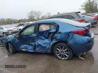 2018 Mazda 3 Touring with VIN 3MZBN1V35JM217641, listed as a IAAI auction lot 41943433 with 64,884 mi miles. Bid and sale history available at carsss.com. Image 6.