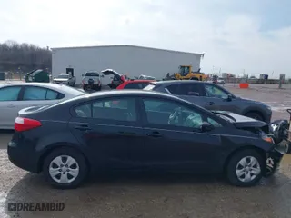 2015 Kia Forte LX with VIN KNAFK4A62F5311887, listed as a IAAI auction lot 41671491 with 99,286 mi miles. Bid and sale history available at carsss.com. Image 14.