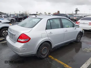 2009 Nissan Versa S with VIN 3N1BC11E39L364397, listed as a IAAI auction lot 41788772 with 223,959 mi miles and . Bid and sale history available at DreamBid. Image 4.
