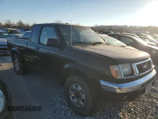 1999 Nissan Frontier XE with VIN 1N6ED26Y4XC322021, listed as a Copart auction lot 82690214 with 102,758 mi miles and Clean title. Bid and sale history available at DreamBid. Image 4.