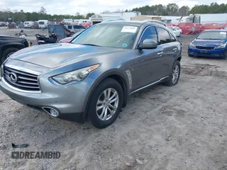 2015 Infiniti QX70 with VIN JN8CS1MWXFM480906, listed as a IAAI auction lot 41177811 with 176,527 mi miles and . Bid and sale history available at DreamBid. Image 2.