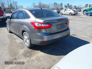 2012 Ford Focus SE with VIN 1FAHP3F23CL287402, listed as a IAAI auction lot 41814364 with 181,686 mi miles. Bid and sale history available at carsss.com. Image 3.