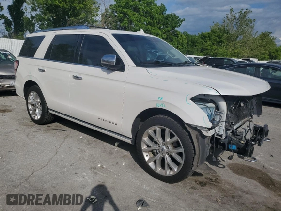 2019 Ford Expedition Platinum with VIN 1FMJU1MT6KEA23724, listed as a Copart auction lot 58489015 with 104,539 mi miles and Salvage title. Bid and sale history available at DreamBid. Image 4.