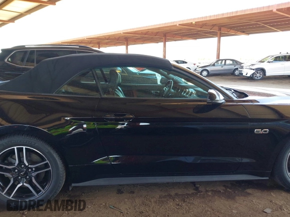 2019 Ford Mustang GT Premium z VIN 1FATP8FF7K5126175, wystawiony jako IAAI lot #42015019 z przebiegiem 91 335 mil mil oraz . Historia ofert i sprzedaży dostępna na DreamBid. Obrazek 13.
