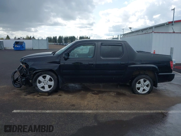 2011 Honda Ridgeline RTL with VIN 5FPYK1F53BB001385, listed as a IAAI auction lot 41945219 with 168,713 mi miles and . Bid and sale history available at DreamBid. Image 14.